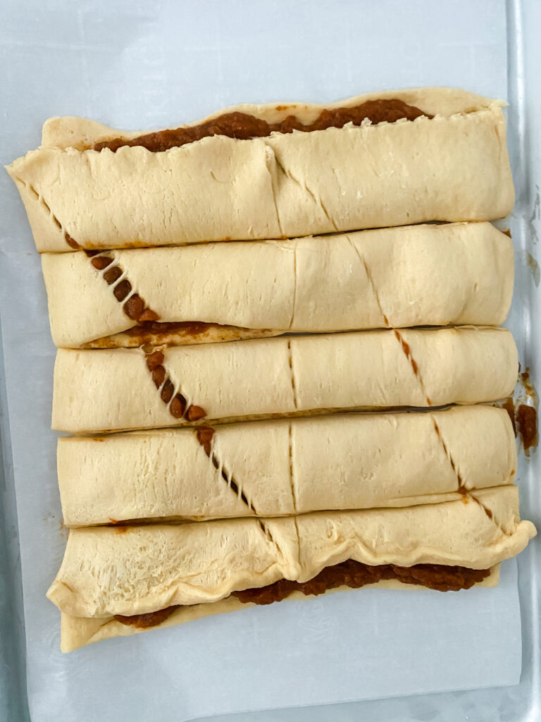 Pumpkin pie strips filling in process