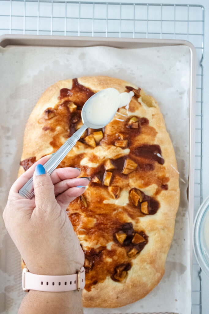 adding glaze to focaccia