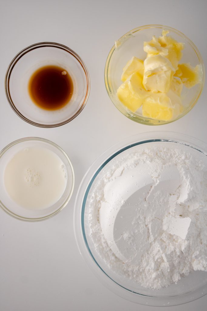 Butter, shortening, powdered sugar, vanilla, and cream for buttercream frosting